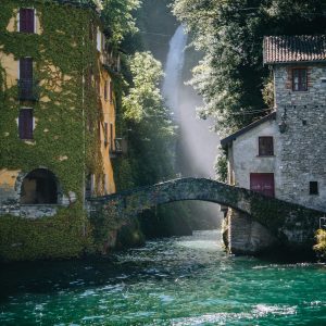 fall-orrido-of-nesso-from-lake-with-a-boat watertfall orrido Nesso - boat tour lake Como